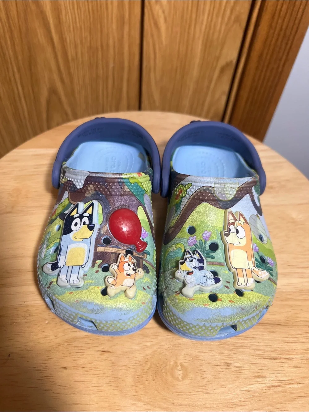 CROCS Blue Kids Cartoon Slip-On Clogs with Red Balloon Accent